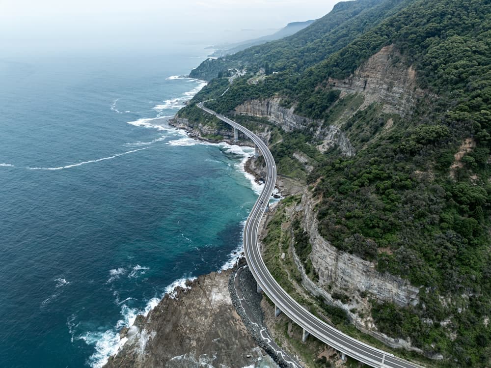 The Sea Cliff Bridge curving along the cliffs south of Sydney